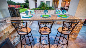 Custom Outdoor Kitchen and Cabana - Floating Bar View by Creekstone Outdoor Living in Houston Texas