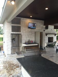 Custom cabana with full outdoor kitchen, fire place in Houston