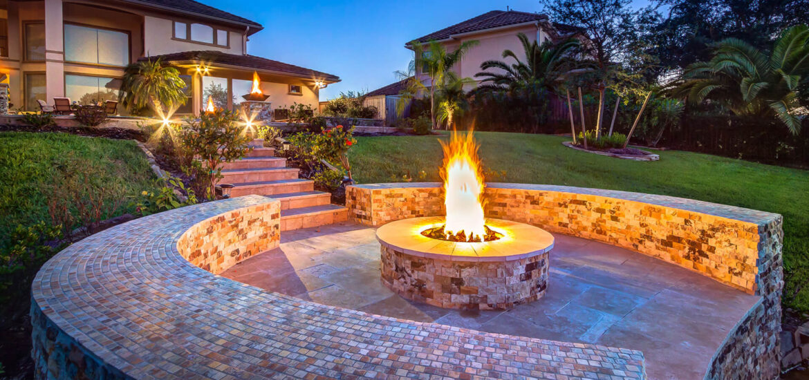 Custom Outdoor Kitchen and Cabana - Fire Pit view by Creekstone Outdoor Living in Houston Texas