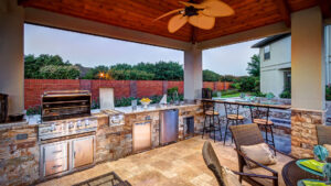 Custom Outdoor Kitchen and Cabana - Kitchen view by Creekstone Outdoor Living in Houston Texas