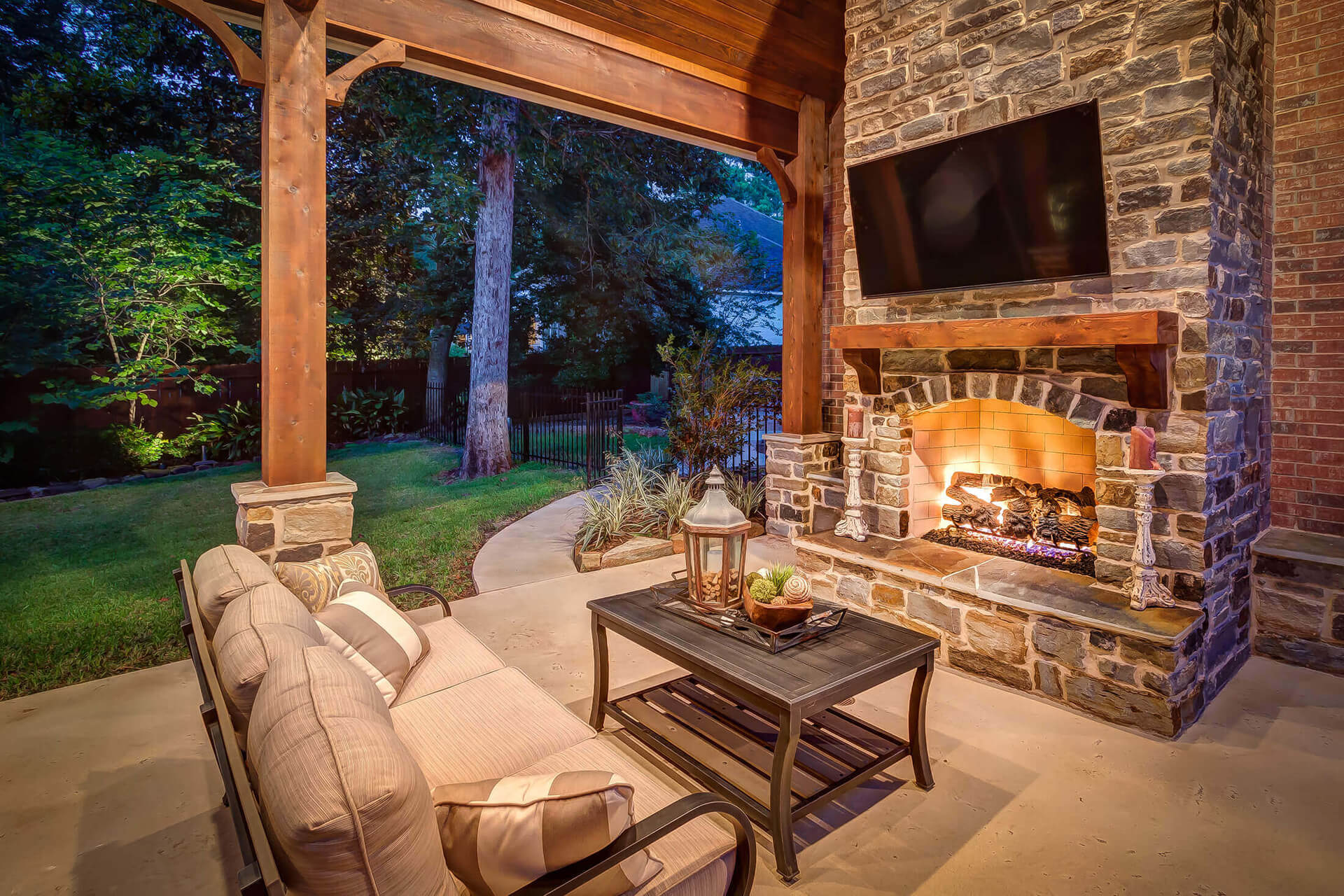 Custom Outdoor Fireplace with Brick by Creekstone Outdoor Living